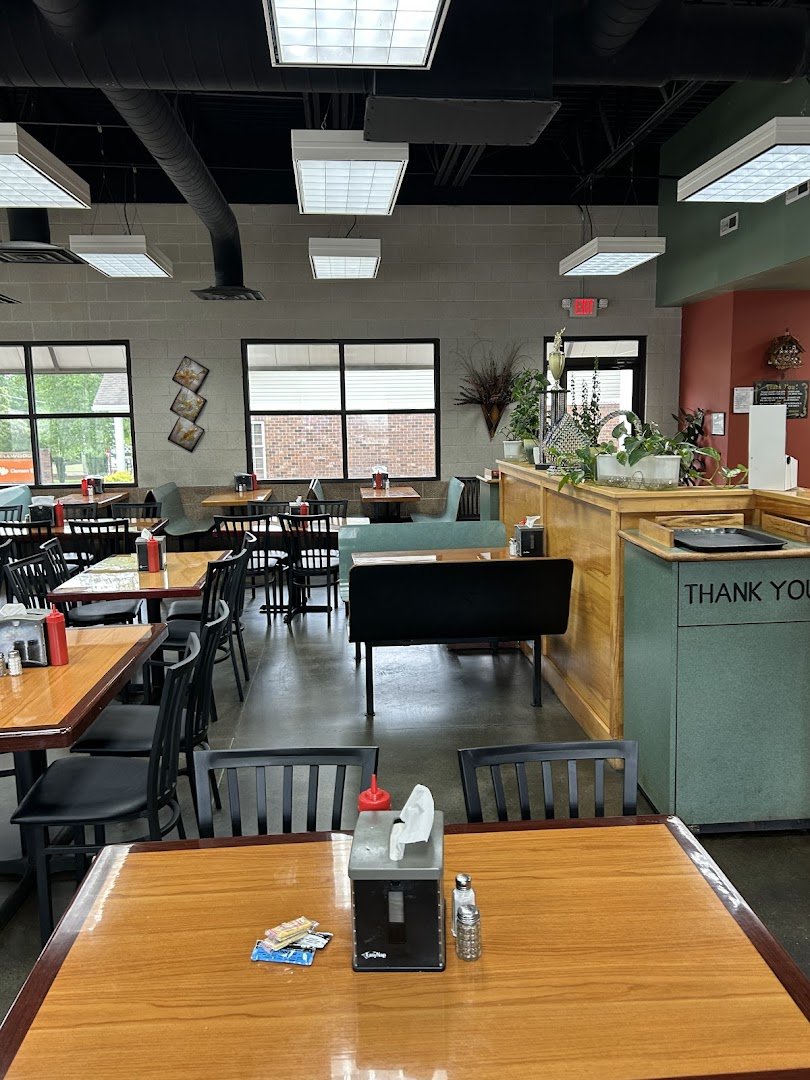 Comfortable restaurant interior with warm, casual seating.